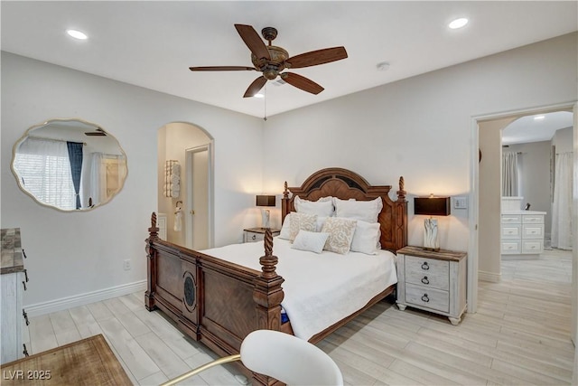 9000 Las Vegas Blvd Unit 2060, Las Vegas, NV 89123 - bedroom featuring arched walkways, light wood-style floors, recessed lighting, and a ceiling fan