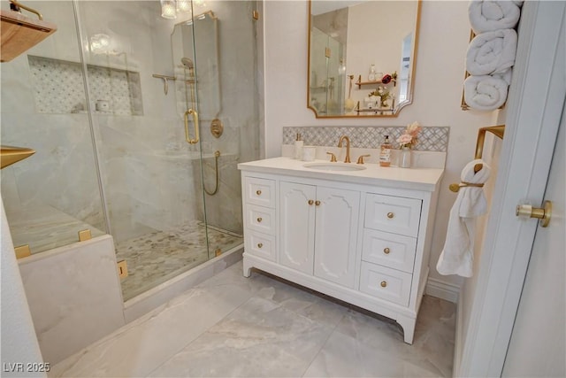 9000 Las Vegas Blvd Unit 2060, Las Vegas, NV 89123 - bathroom with a marble finish shower, decorative backsplash, vanity, and marble finish floors