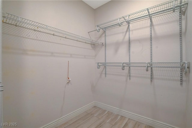 9000 Las Vegas Blvd Unit 2060, Las Vegas, NV 89123 - walk in closet featuring light wood-style flooring