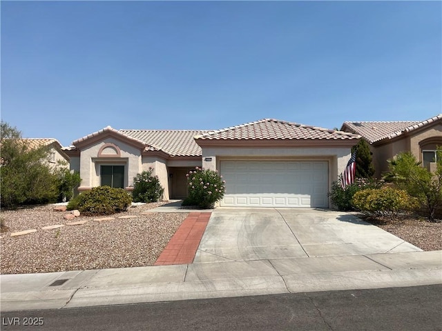 2712 Breakers Creek Dr, Las Vegas, NV 89134 - mediterranean / spanish-style home featuring stucco siding, driveway, a garage, and a tiled roof