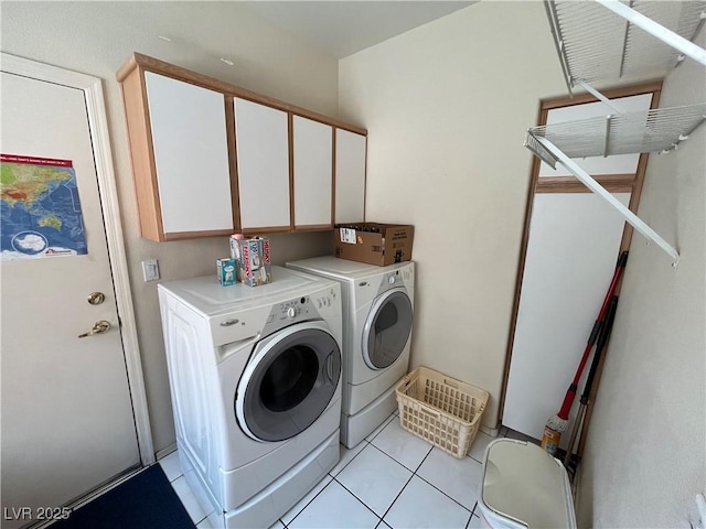 2712 Breakers Creek Dr, Las Vegas, NV 89134 - laundry area with washing machine and dryer, cabinet space, and light tile patterned floors