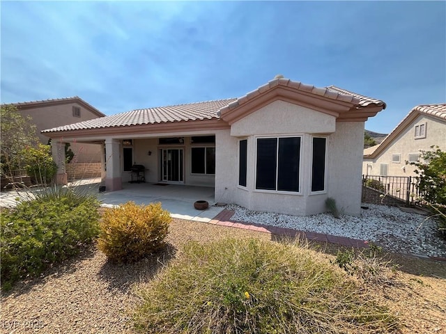 2712 Breakers Creek Dr, Las Vegas, NV 89134 - rear view of property with stucco siding, a patio area, and a tile roof
