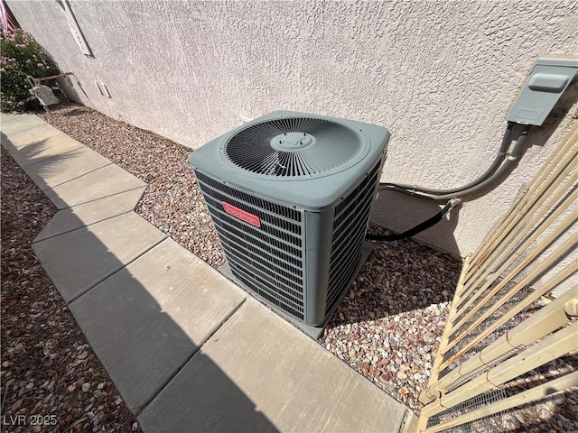 2712 Breakers Creek Dr, Las Vegas, NV 89134 - exterior view of a central AC unit and stucco siding
