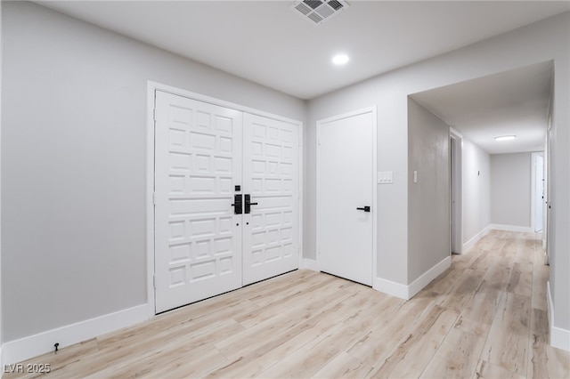 1009 Ironwood Dr, Las Vegas, NV 89108 - foyer featuring light wood-type flooring and recessed lighting
