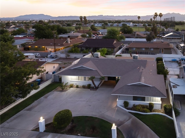 1009 Ironwood Dr, Las Vegas, NV 89108 - aerial view at dusk of a mountain view and a residential view