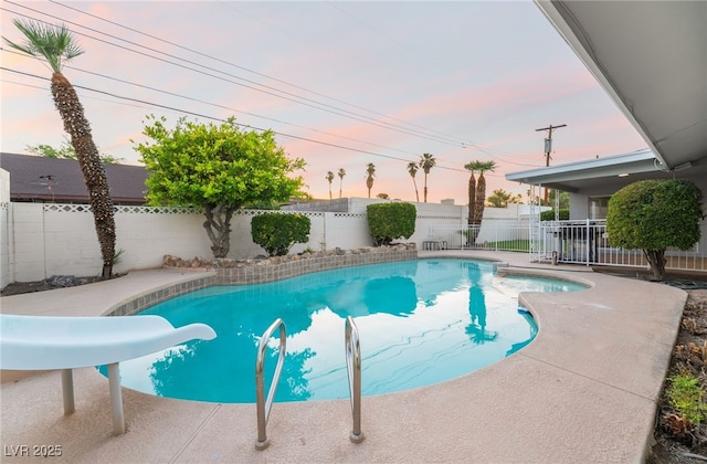 1009 Ironwood Dr, Las Vegas, NV 89108 - view of swimming pool with a water slide and a fenced backyard