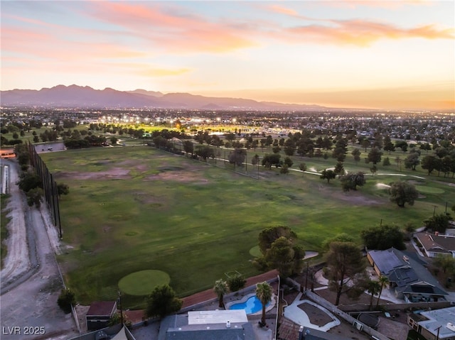 1009 Ironwood Dr, Las Vegas, NV 89108 - aerial view of property's location with a mountain backdrop and a pool area