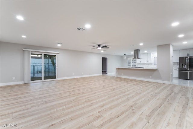 1009 Ironwood Dr, Las Vegas, NV 89108 - unfurnished living room with recessed lighting, light wood-style flooring, and ceiling fan