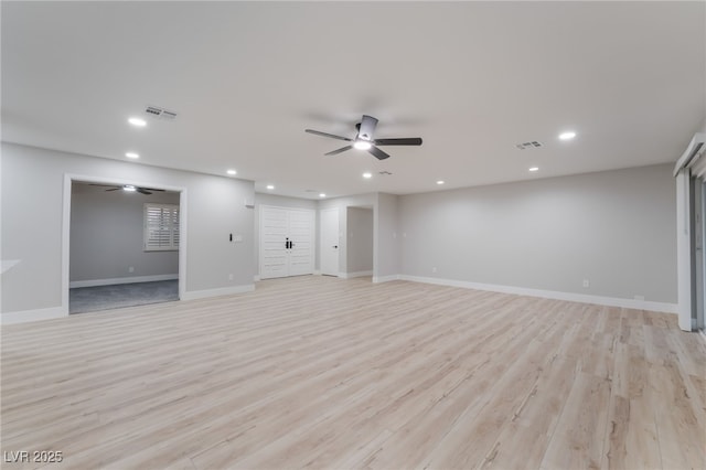 1009 Ironwood Dr, Las Vegas, NV 89108 - unfurnished living room with ceiling fan, recessed lighting, and light wood-style floors