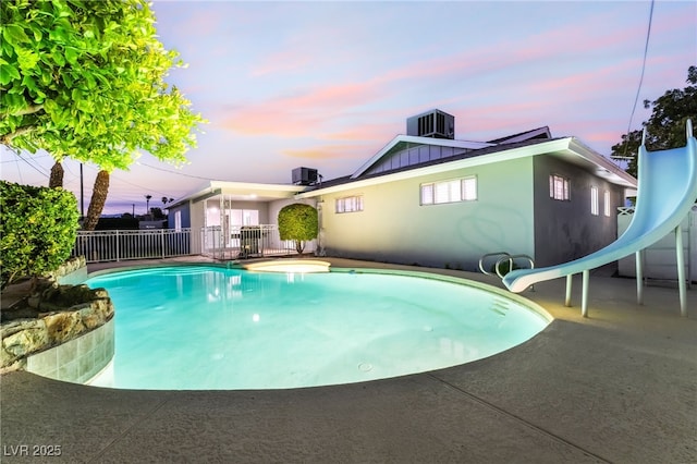 1009 Ironwood Dr, Las Vegas, NV 89108 - view of swimming pool with a water slide and a patio