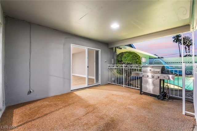 1009 Ironwood Dr, Las Vegas, NV 89108 - patio terrace at dusk featuring area for grilling
