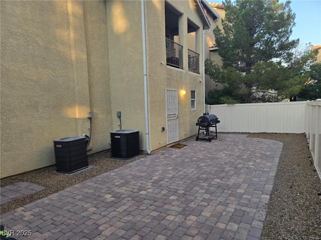 8949 Brian Christopher Ave, Las Vegas, NV 89149 - patio / terrace with a fenced backyard, a patio, and area for grilling