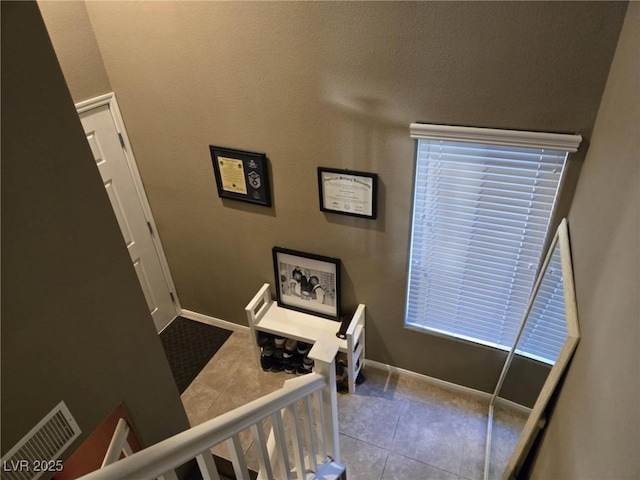 8949 Brian Christopher Ave, Las Vegas, NV 89149 - stairs featuring tile patterned flooring and baseboards