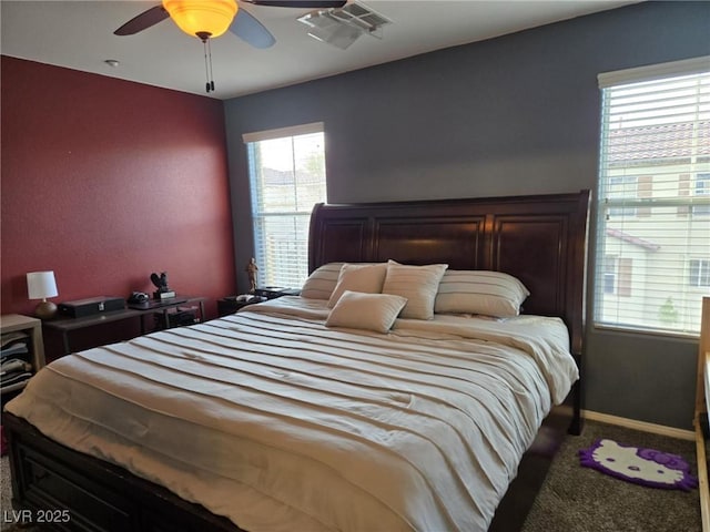 8949 Brian Christopher Ave, Las Vegas, NV 89149 - carpeted bedroom with a ceiling fan and baseboards