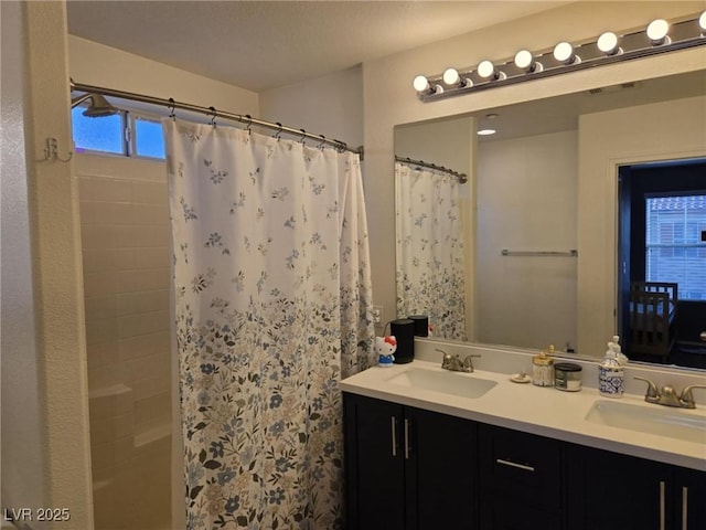 8949 Brian Christopher Ave, Las Vegas, NV 89149 - bathroom featuring double vanity and a shower with shower curtain
