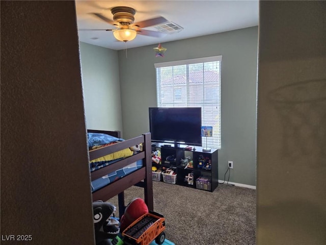 8949 Brian Christopher Ave, Las Vegas, NV 89149 - carpeted bedroom with baseboards and a ceiling fan