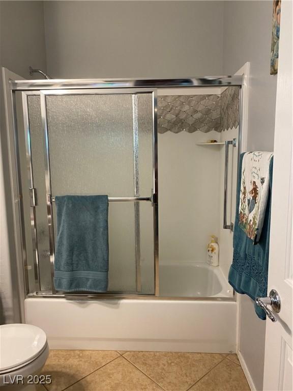 2345 Minolta Ct, Henderson, NV 89044 - bathroom with tile patterned flooring and shower / bath combination with glass door