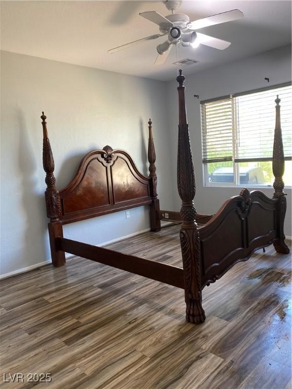 2345 Minolta Ct, Henderson, NV 89044 - bedroom with wood finished floors and ceiling fan