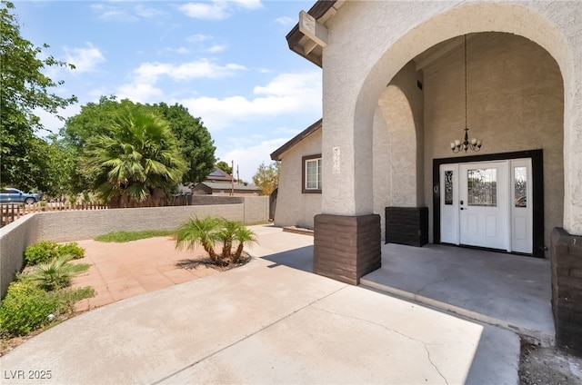 5676 Birchwood Cir, Las Vegas, NV 89120 - doorway to property featuring stucco siding