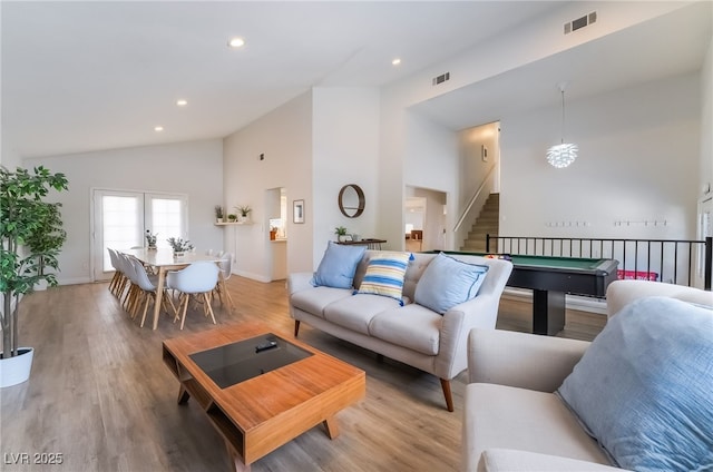 5676 Birchwood Cir, Las Vegas, NV 89120 - living area with light wood finished floors, high vaulted ceiling, recessed lighting, and billiards