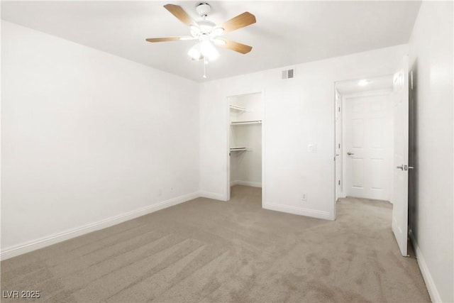2801 N Rainbow Blvd Unit 235, Las Vegas, NV 89108 - unfurnished bedroom with light colored carpet, a walk in closet, and ceiling fan