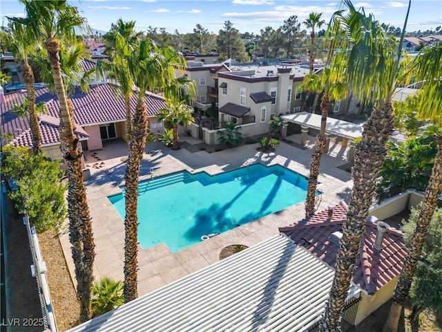 2801 N Rainbow Blvd Unit 235, Las Vegas, NV 89108 - community pool featuring a patio and a residential view