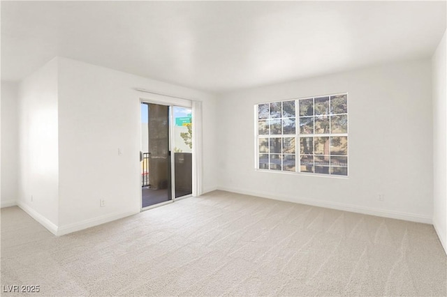 2801 N Rainbow Blvd Unit 235, Las Vegas, NV 89108 - carpeted empty room with baseboards
