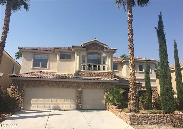 7414 Page Ranch Ct, Las Vegas, NV 89131 - mediterranean / spanish-style home featuring a garage, concrete driveway, stucco siding, and a tiled roof