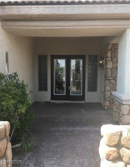 7414 Page Ranch Ct, Las Vegas, NV 89131 - entrance to property featuring french doors and stucco siding