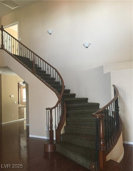 7414 Page Ranch Ct, Las Vegas, NV 89131 - stairway with wood finished floors and baseboards