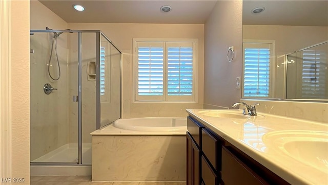 7469 Paces Mill Ct, Las Vegas, NV 89113 - full bath featuring a garden tub, healthy amount of natural light, a stall shower, and recessed lighting