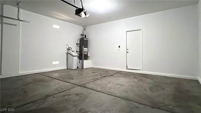 7469 Paces Mill Ct, Las Vegas, NV 89113 - garage featuring water heater and a garage door opener