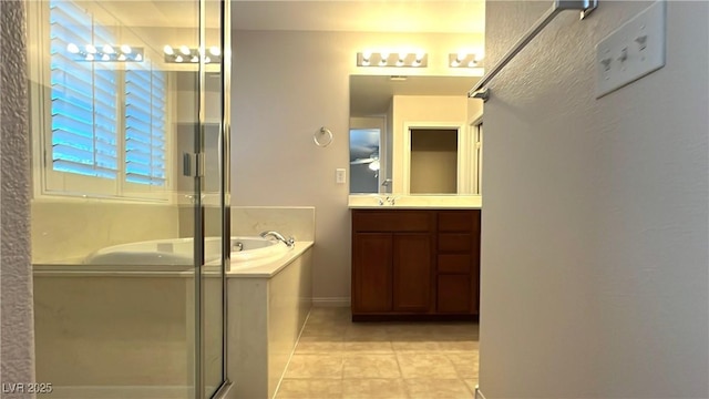 7469 Paces Mill Ct, Las Vegas, NV 89113 - full bath featuring vanity, a garden tub, tile patterned floors, and a shower stall