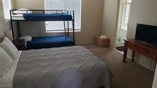 6117 Glenborough St, Las Vegas, NV 89115 - carpeted bedroom featuring baseboards