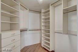 2877 Paradise Rd Unit 904, Las Vegas, NV 89109 - spacious closet featuring wood finished floors