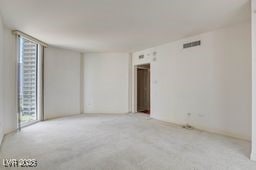 2877 Paradise Rd Unit 904, Las Vegas, NV 89109 - carpeted spare room with plenty of natural light