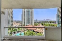 2877 Paradise Rd Unit 904, Las Vegas, NV 89109 - balcony featuring a mountain view and a view of city