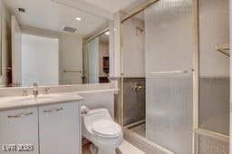 2877 Paradise Rd Unit 904, Las Vegas, NV 89109 - full bathroom with vanity and a stall shower