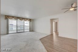 2877 Paradise Rd Unit 904, Las Vegas, NV 89109 - unfurnished living room with ceiling fan