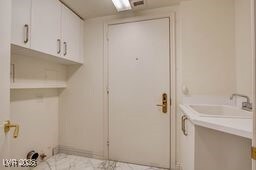 2877 Paradise Rd Unit 904, Las Vegas, NV 89109 - laundry room with a sink