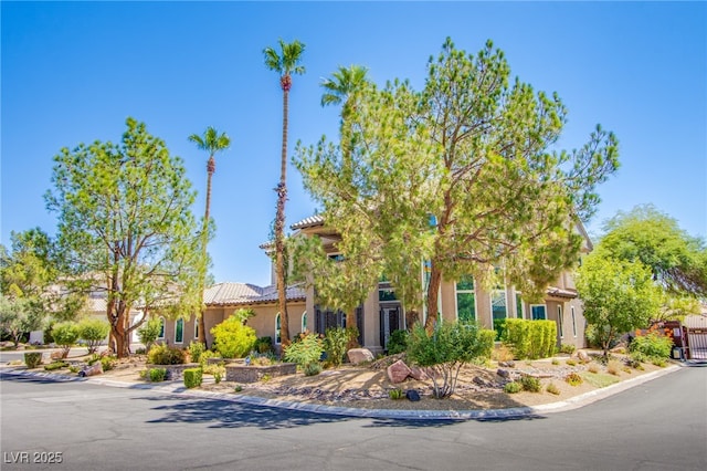 1890 Pago Ct, Las Vegas, NV 89117 - view of front of house with a tiled roof and stucco siding