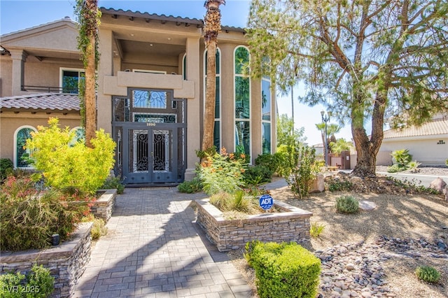 1890 Pago Ct, Las Vegas, NV 89117 - property entrance featuring french doors and stucco siding