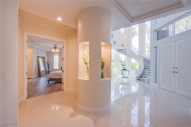 1890 Pago Ct, Las Vegas, NV 89117 - entrance foyer featuring plenty of natural light, stairway, ornamental molding, recessed lighting, and marble finish floors
