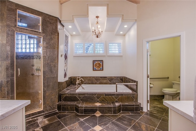 1890 Pago Ct, Las Vegas, NV 89117 - bathroom featuring vanity, a garden tub, a stall shower, a chandelier, and recessed lighting