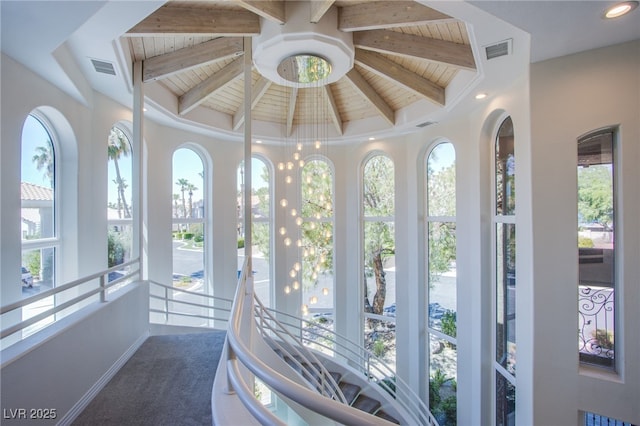 1890 Pago Ct, Las Vegas, NV 89117 - unfurnished sunroom with healthy amount of natural light and beamed ceiling