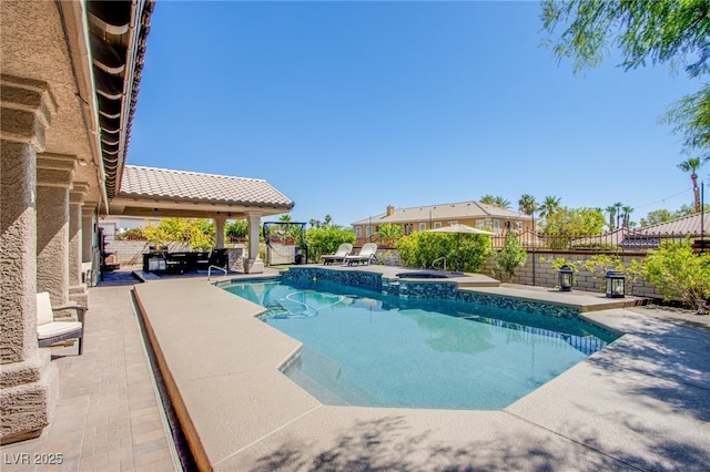 1890 Pago Ct, Las Vegas, NV 89117 - view of pool featuring an in-ground hot tub, a patio, and a fenced backyard