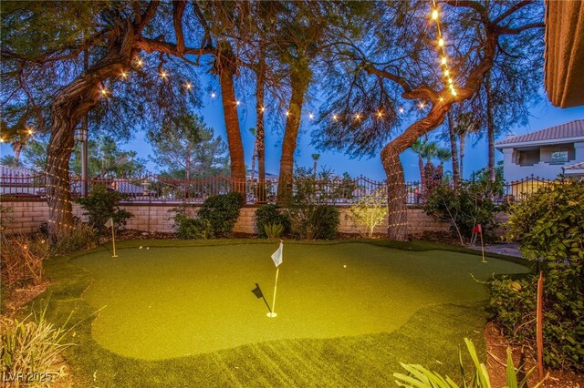 1890 Pago Ct, Las Vegas, NV 89117 - fenced backyard featuring a putting area
