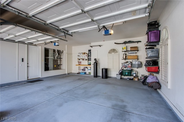 1890 Pago Ct, Las Vegas, NV 89117 - garage featuring a garage door opener and heating unit
