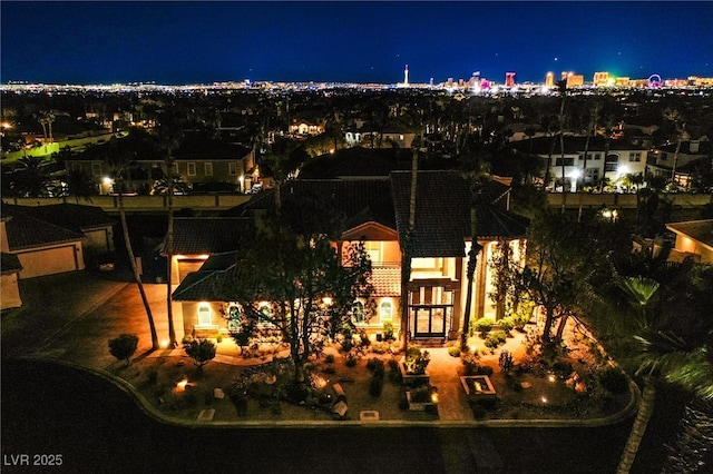 1890 Pago Ct, Las Vegas, NV 89117 - back of house at twilight with a view of city lights