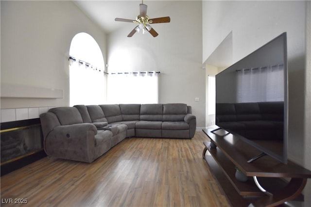 6628 Ives Ave, Las Vegas, NV 89108 - living room featuring a ceiling fan, wood finished floors, and high vaulted ceiling